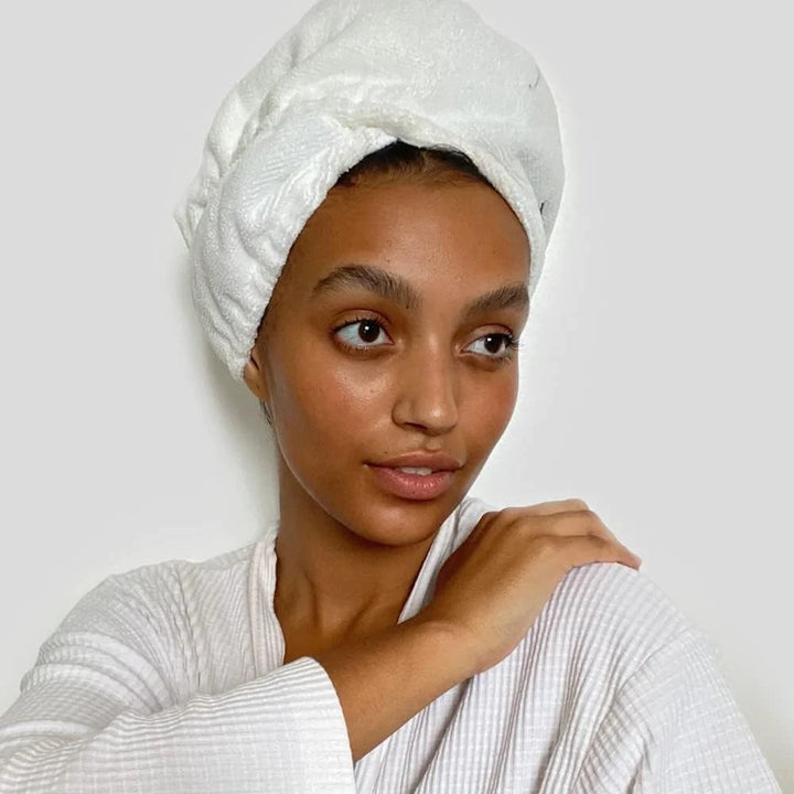 Woman with a Hairburst microfibre hair towel wrapped around her head