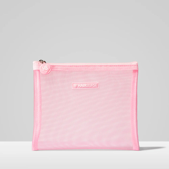 Pink mesh wash bag with Hairburst branding